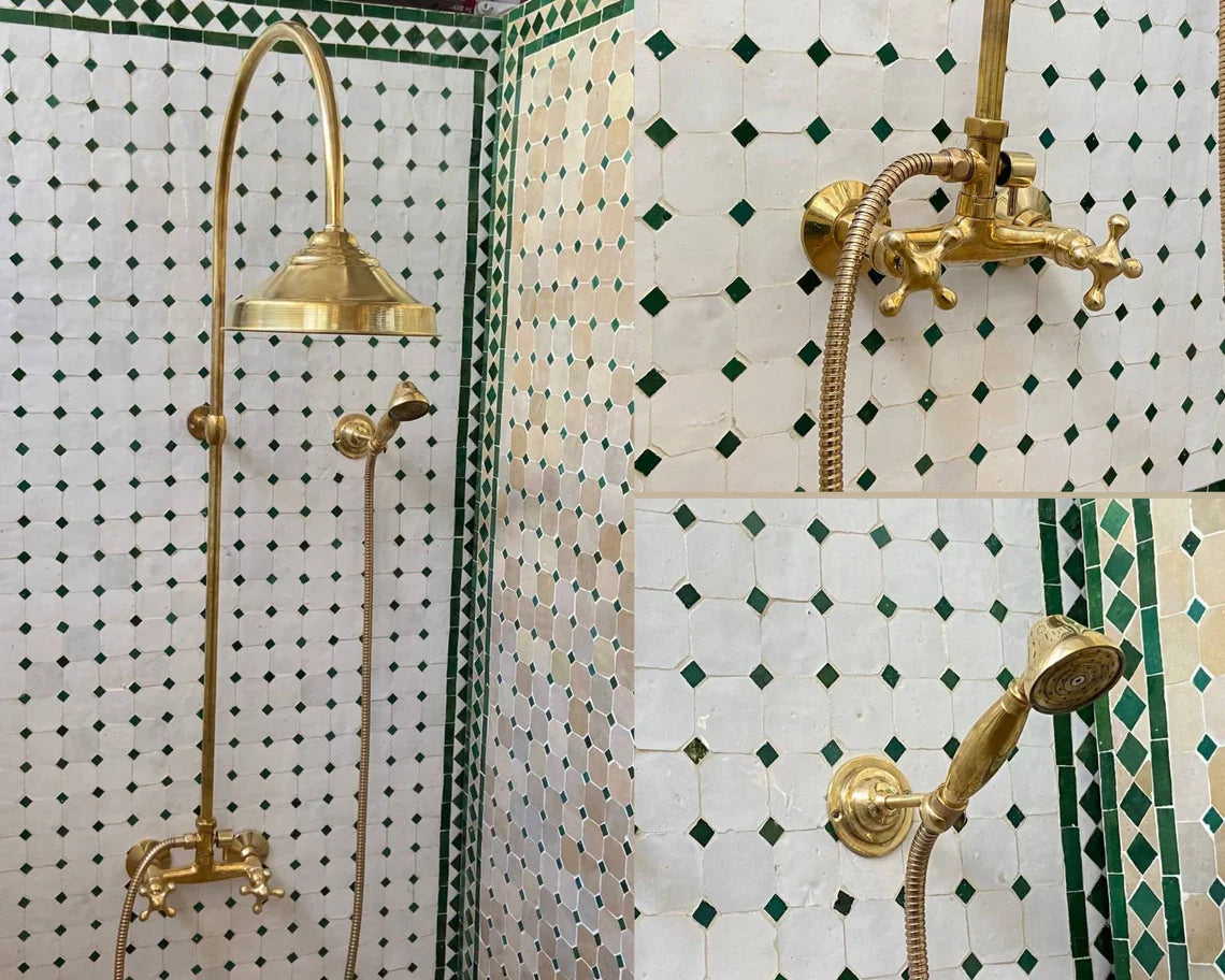 Gold shower fixtures on a tiled wall with geometric patterns