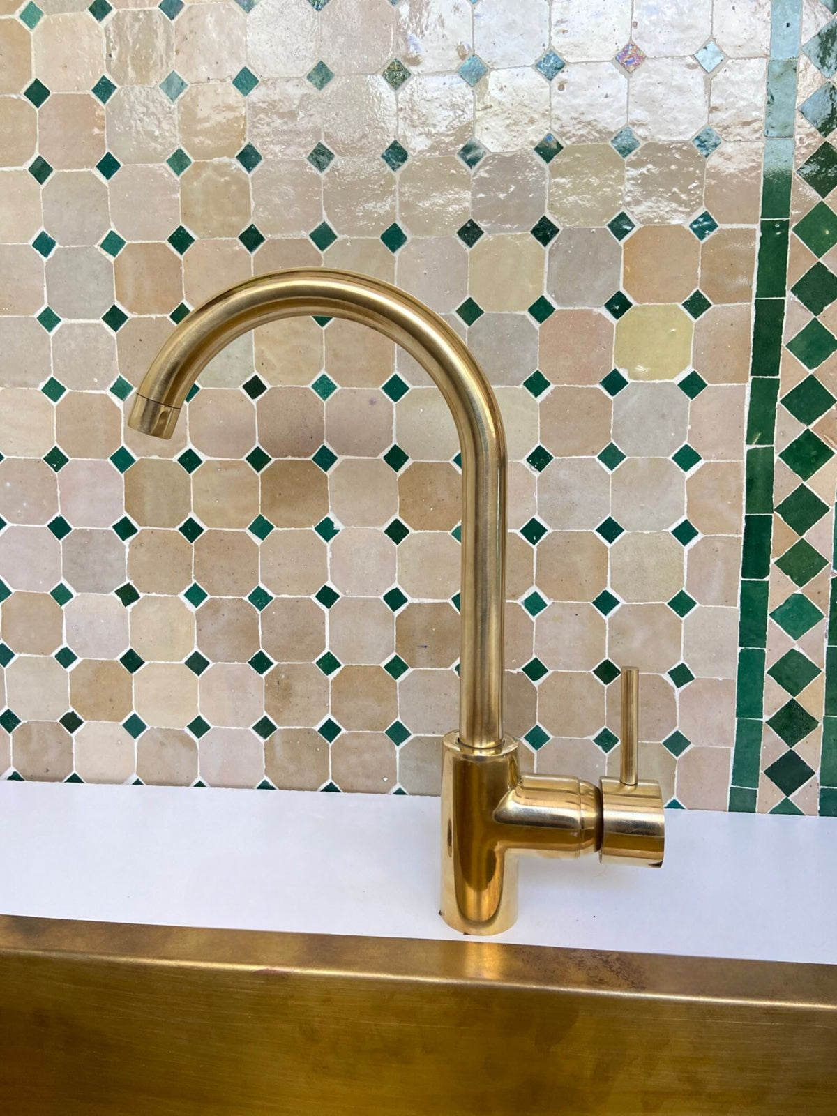 Unlacquered Brass Single Hole  kitchen faucet.