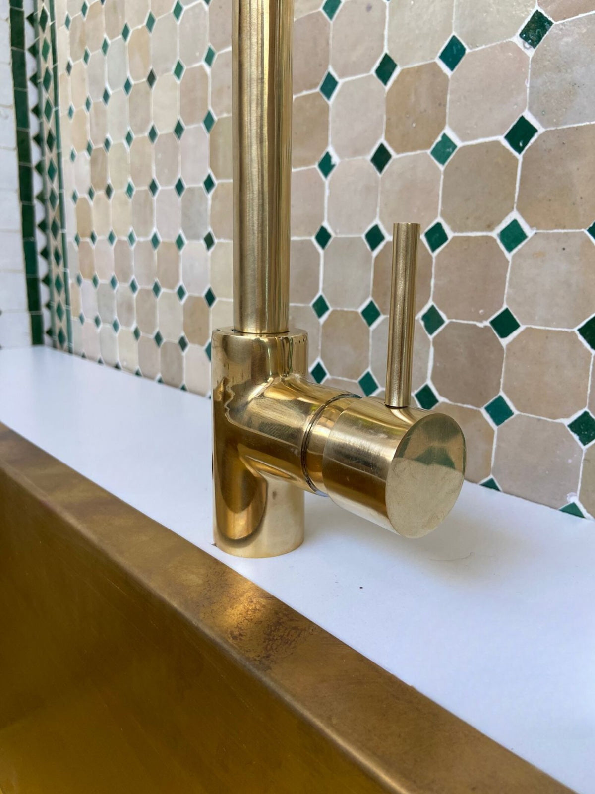 Unlacquered Brass Single Hole  kitchen faucet.