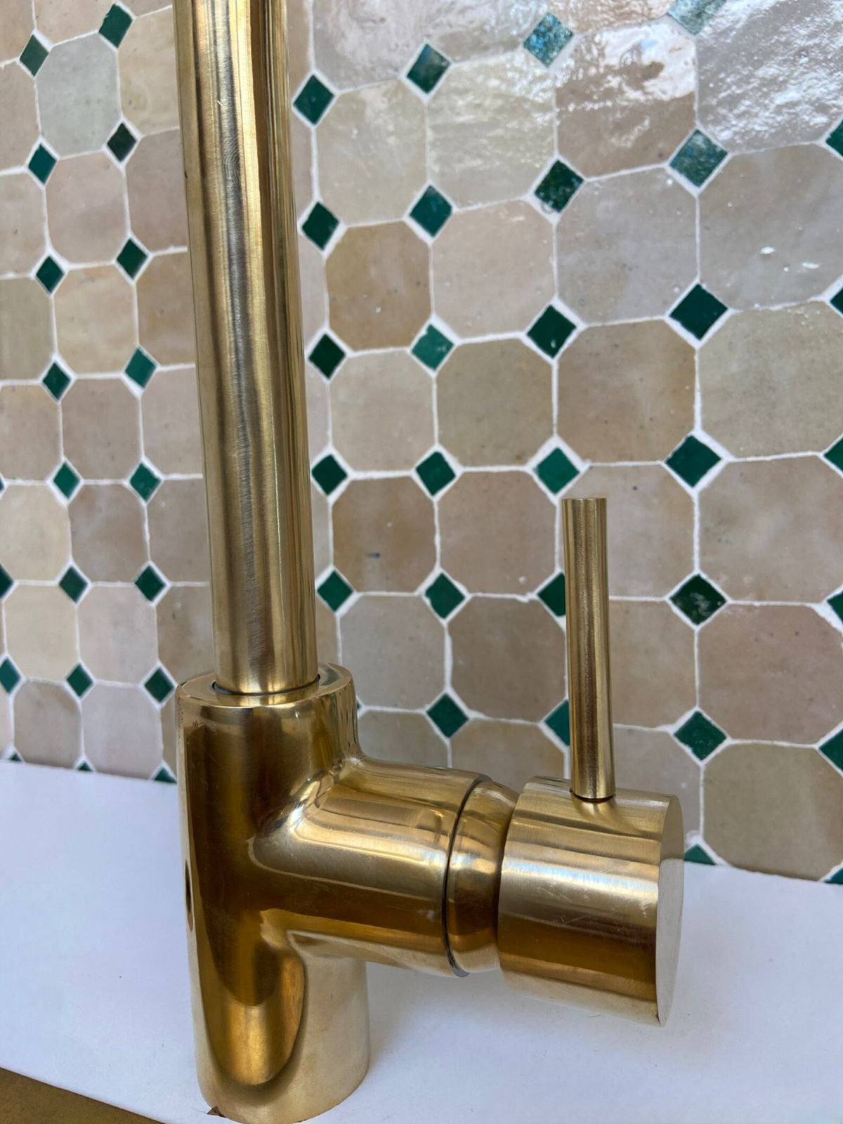 Unlacquered Brass Single Hole  kitchen faucet.