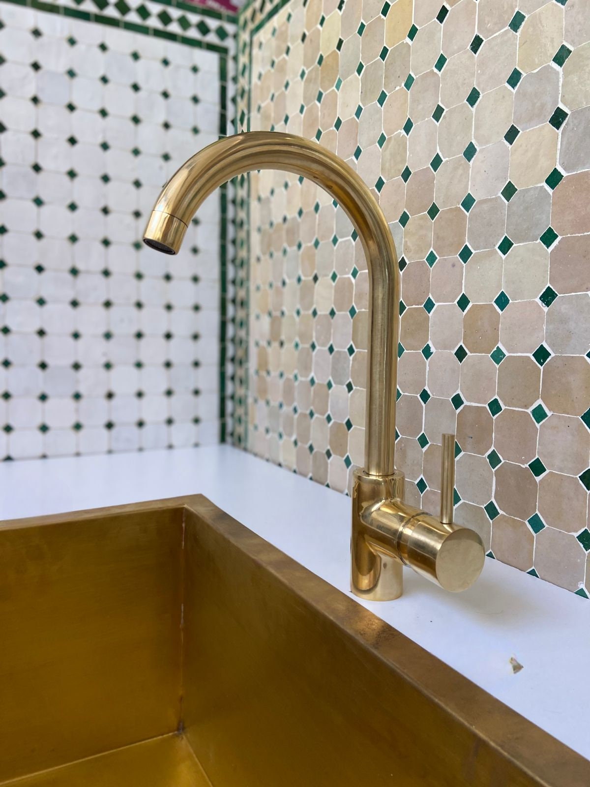 Unlacquered Brass Single Hole  kitchen faucet.