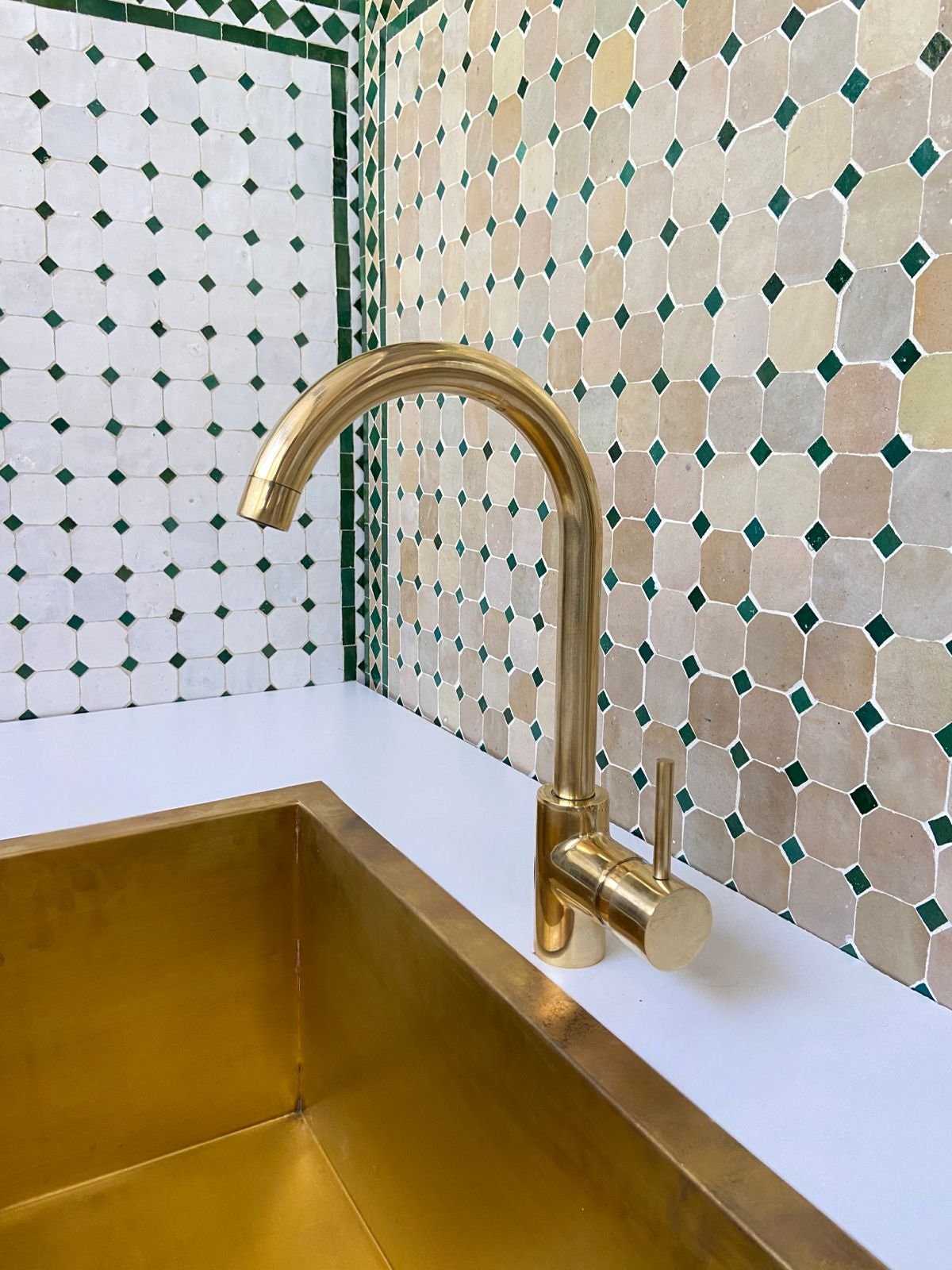 Unlacquered Brass Single Hole  kitchen faucet.