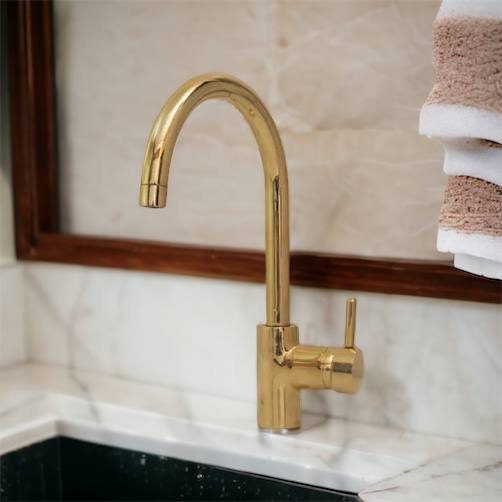 Unlacquered Brass Single Hole  kitchen faucet.