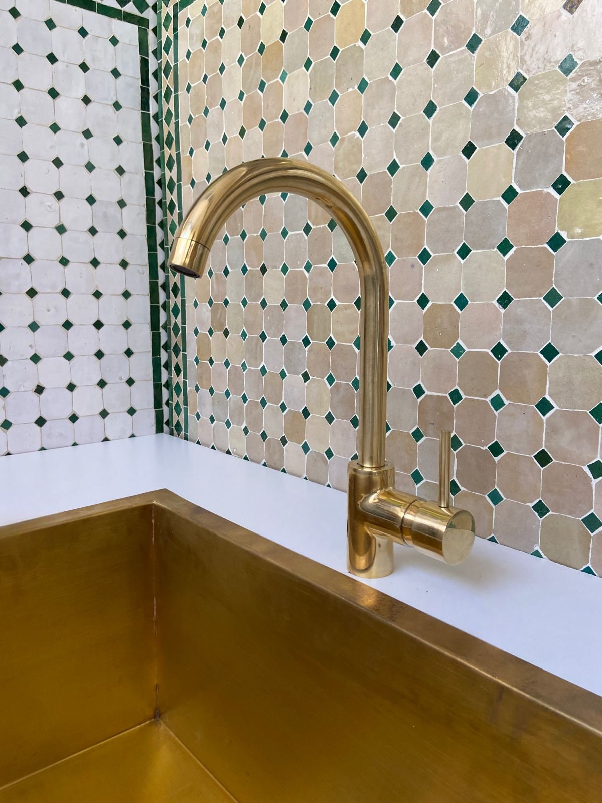 Unlacquered Brass Single Hole  kitchen faucet.