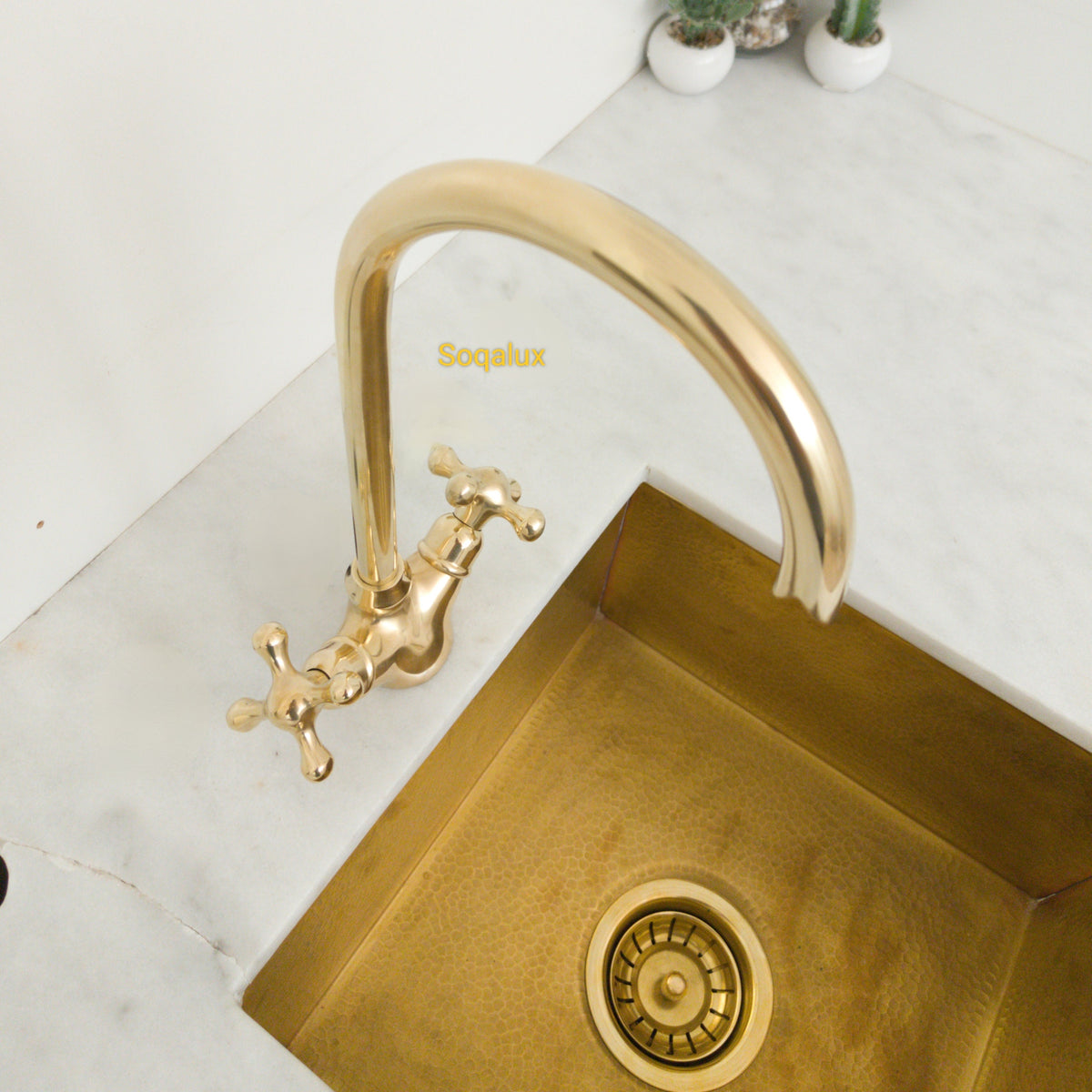 Unlacquered Solid brass kitchen faucet.