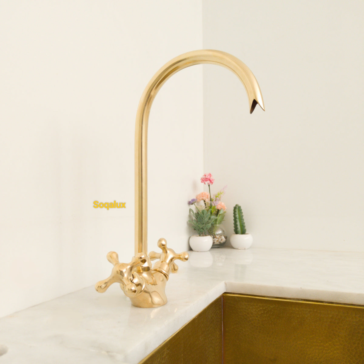 Unlacquered Solid brass kitchen faucet.