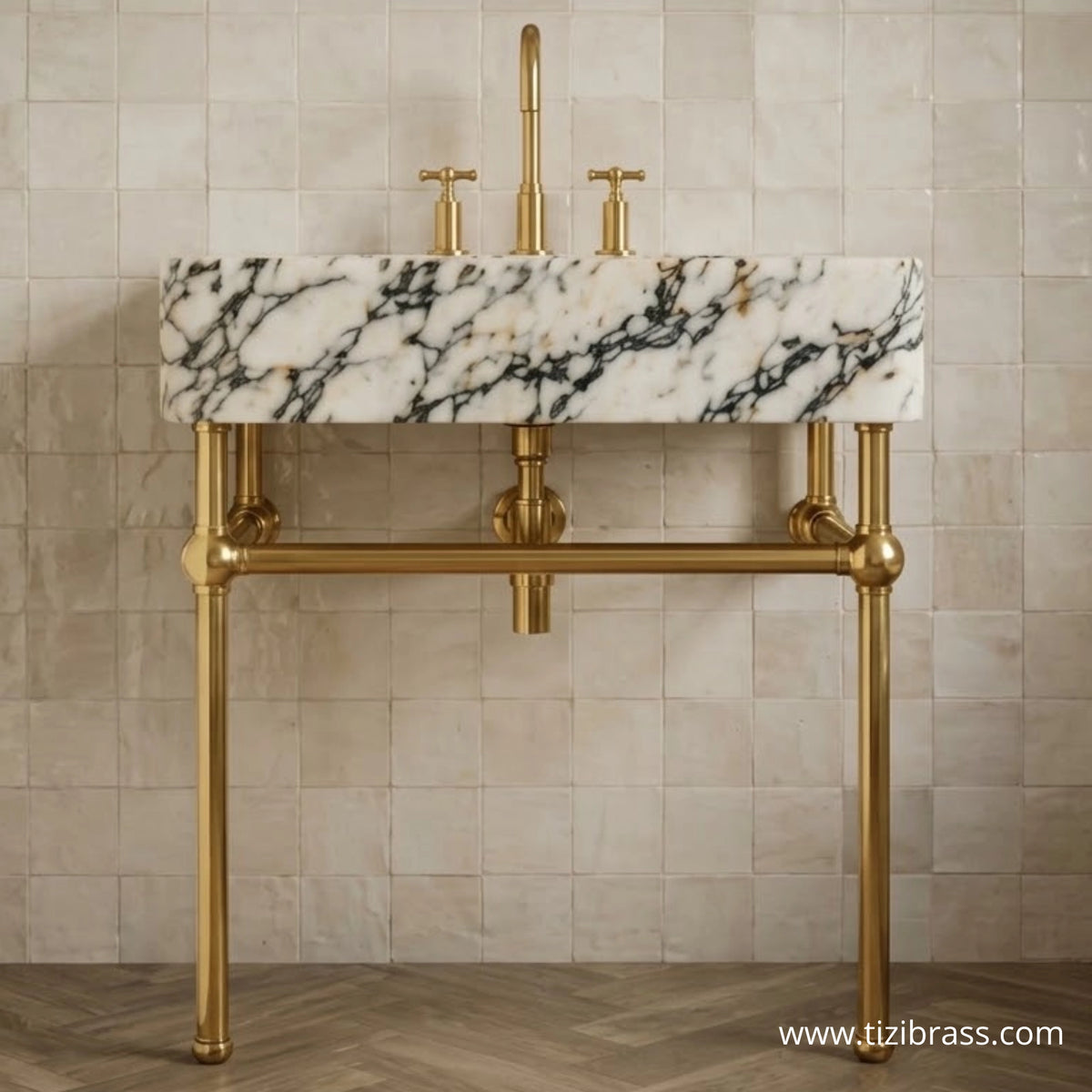 Unlacquered brass console legs supporting marble vanity top, freestanding bathroom sink